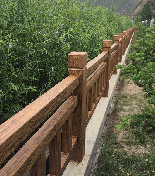 儋州景区水泥凹凸护栏仿木纹施工